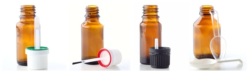 Pipettes, brushes, point spreaders and measuring spoons fill glass bottles for essential oils